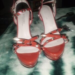 Red pair of spike heels size 6 rlwlovesjaw064@gmail.com.they are beautiful